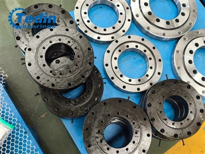 টেডিন সফলভাবে ক্রসড রোলার বিয়ারিংস RU148UUC0P5 এর কালো অক্সাইড চিকিত্সার সাথ...